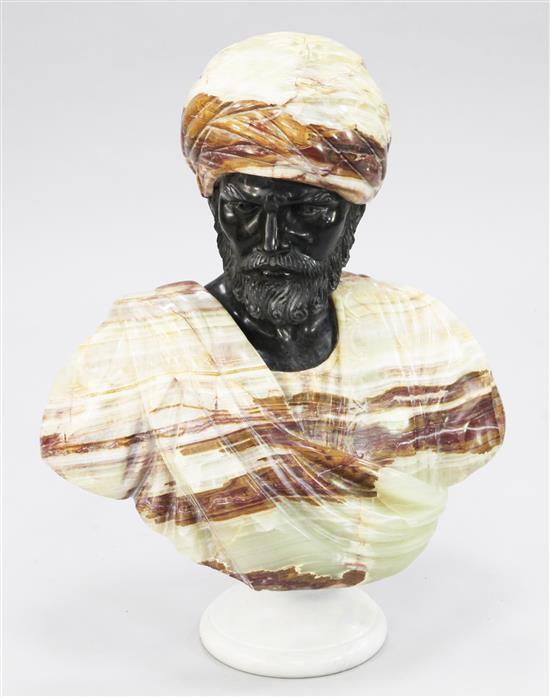 A large 20th century onyx and marble carved bust of an Arab, 2ft 4ins high